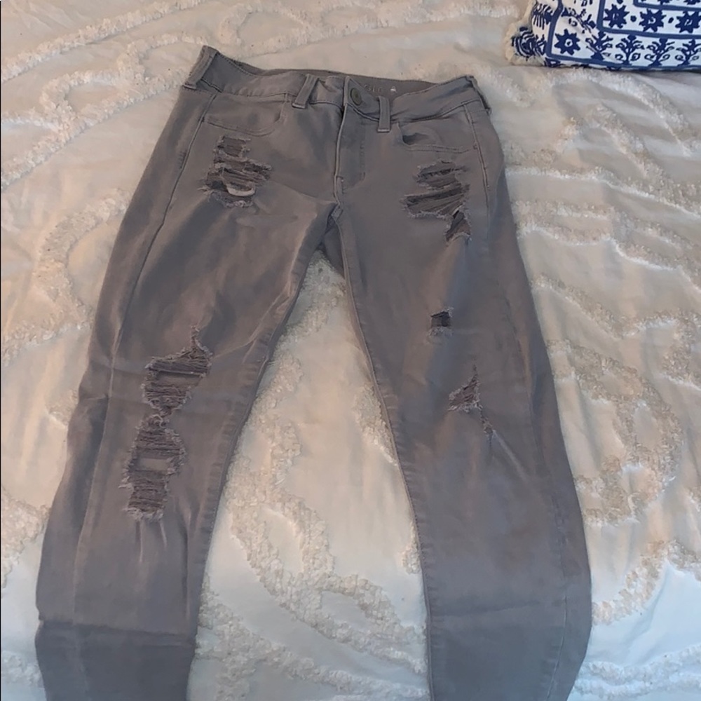 Grey ripped jeans